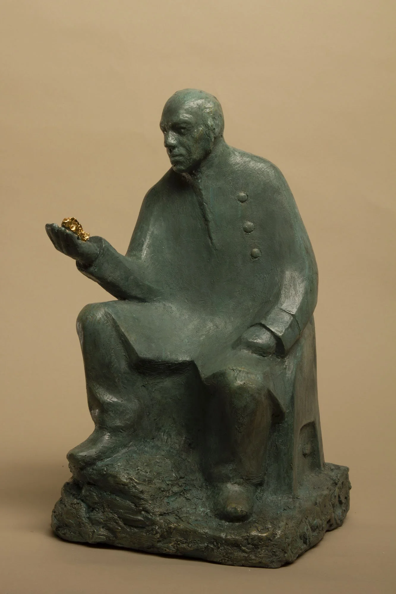 Bronze portrait maquette of a seated man