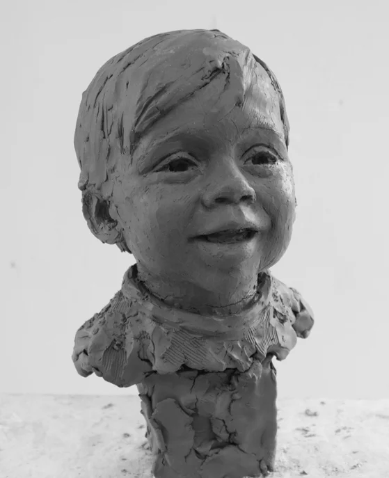 Albie's portrait being sculpted in clay