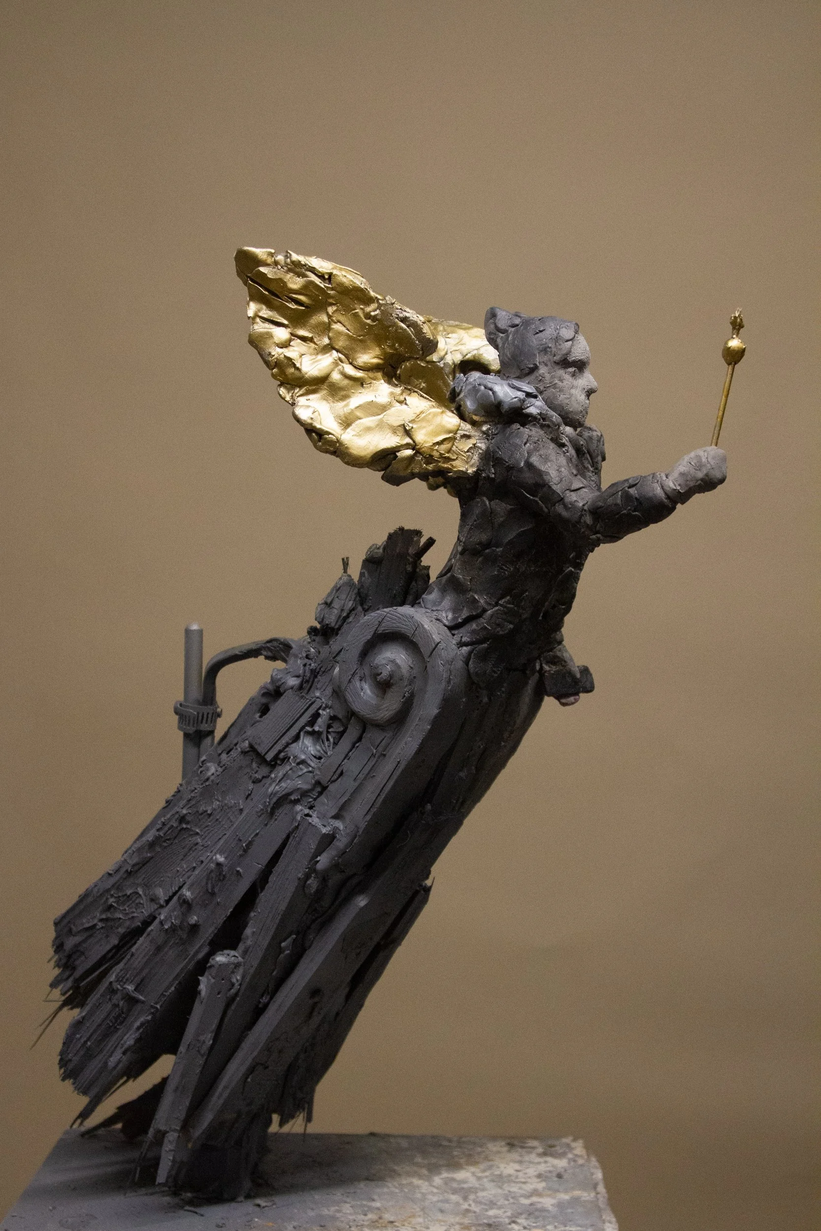 Public sculpture maquette with a gilded figure
